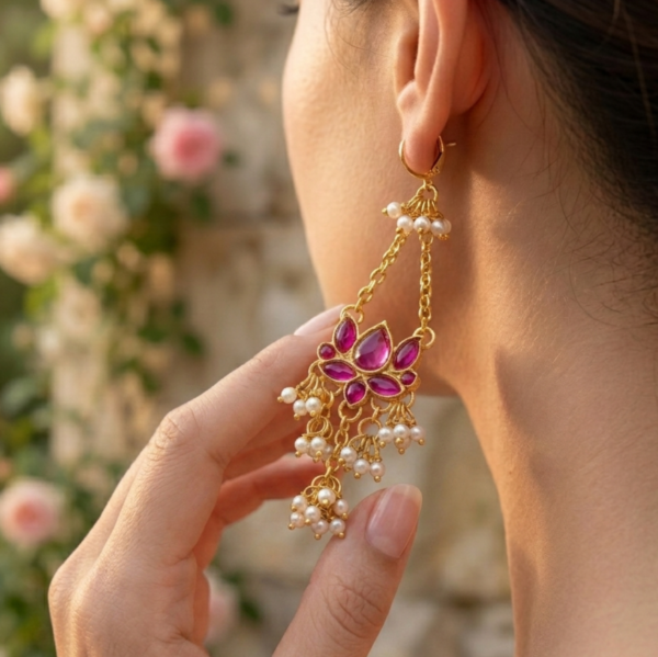 luxury festive statement earrings in anti-tarnish brass featuring layered pearl clusters and deep purple stones.